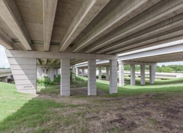 view of bridge columns under bridge at PGBT